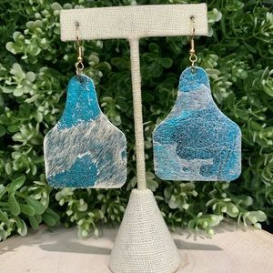 Cow tag blue earrings